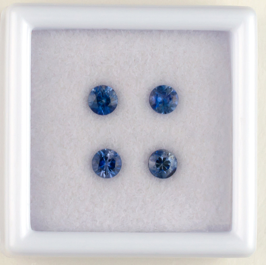 0.71twt Blue Sapphire Colored Gemstone Melee Parcel Top View II White Background
