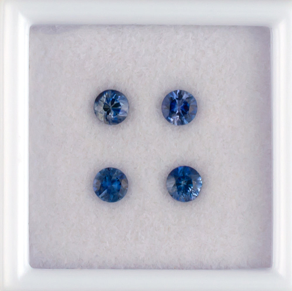 0.71twt Blue Sapphire Colored Gemstone Melee Parcel Top View White Background 
