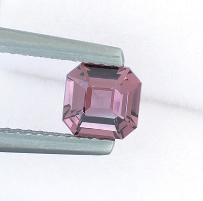 0.89ct Lavender Spinel Colored Gemstone Top View White Background Tweezers