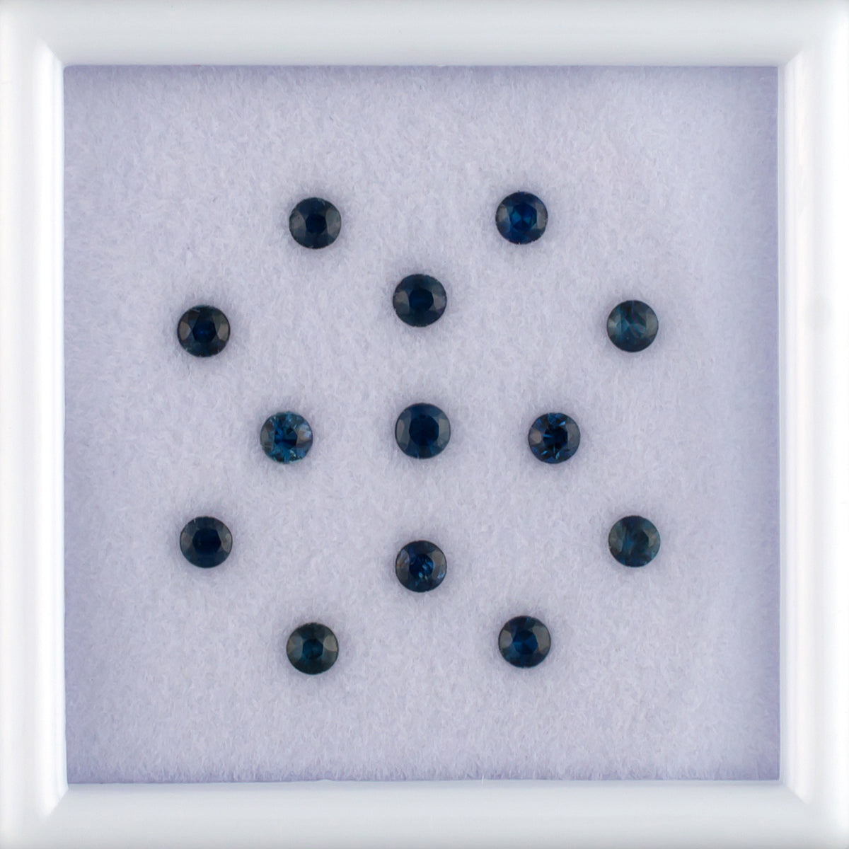 0.93twt Blue Sapphire Colored Gemstone Melee Parcel Top View White Background
