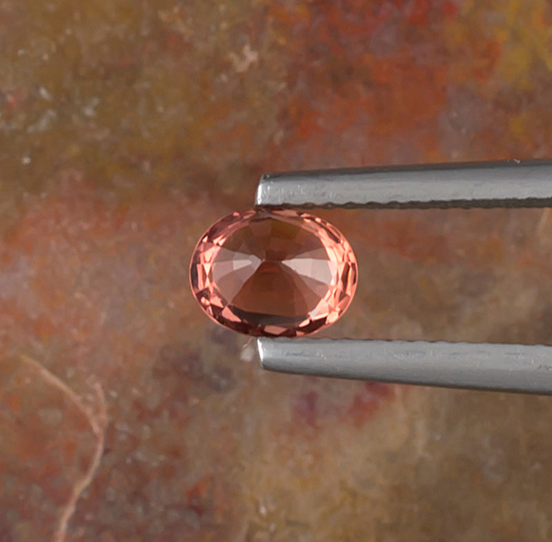 1.00ct Pink Orange Padparadscha Spinel Bottom View Natural Background 
