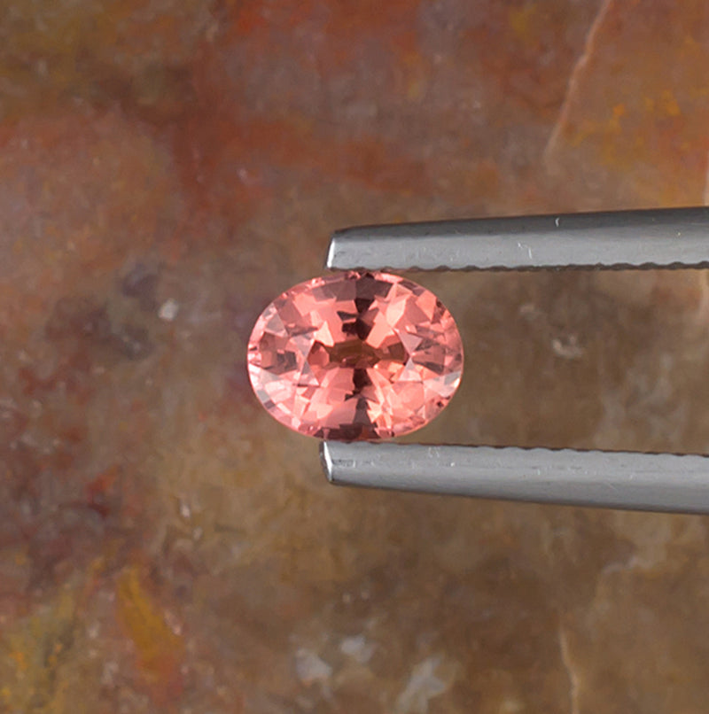 1.00ct Pink Orange Padparadscha Spinel Top View Natural Background 
