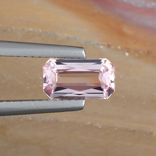 1.01ct Morganite Colored Gemstone Top View Natural Background 
