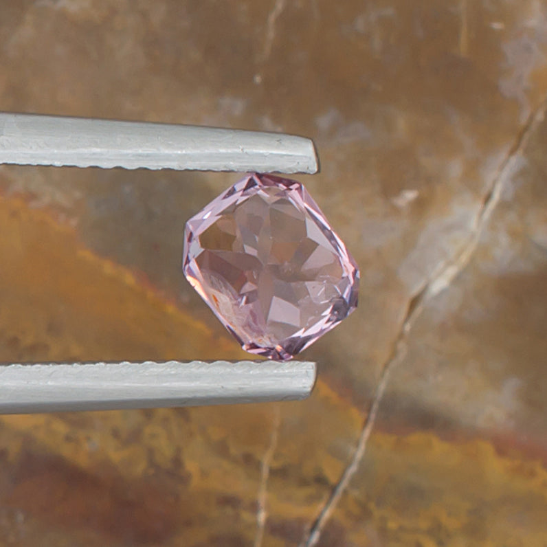 1.07ct Pink Spinel Colored Gemstone Bottom View Natural Background 