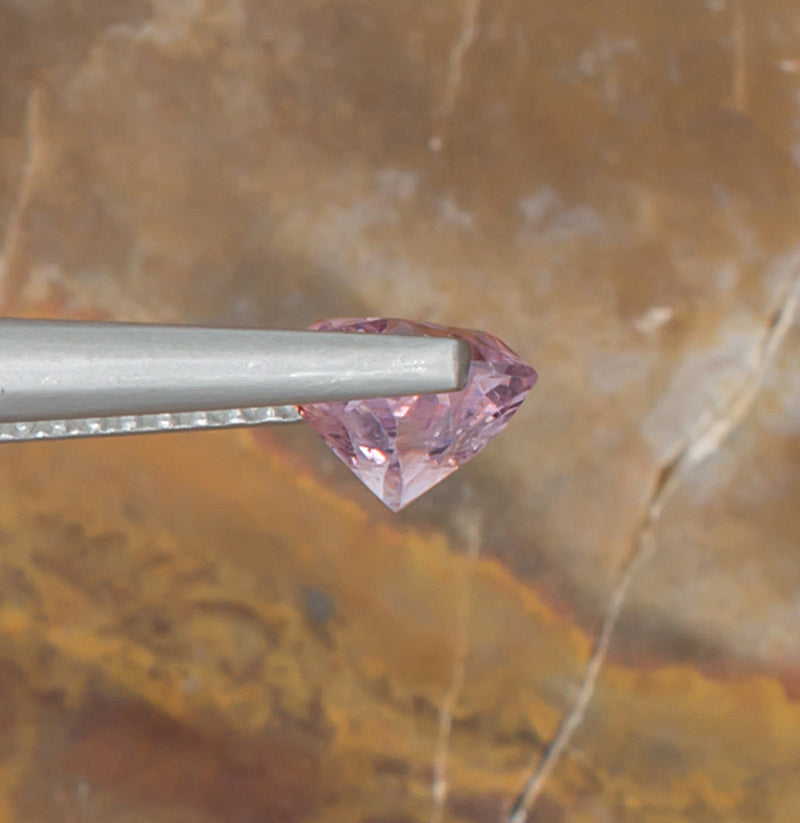 1.07ct Pink Spinel Colored Gemstone Side View Natural Background 