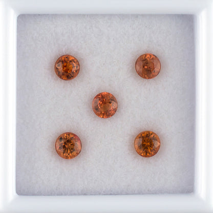 1.18twt Orange Sapphire Colored Gemstone Melee Parcel Top View White Background 
