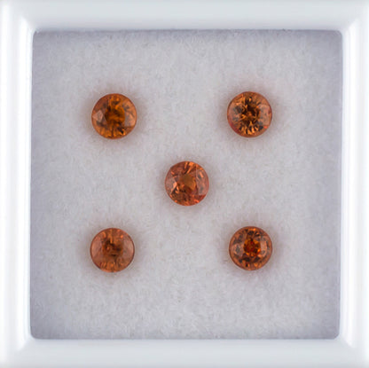 1.18twt Orange Sapphire Colored Gemstone Melee Parcel Top View White Background 
