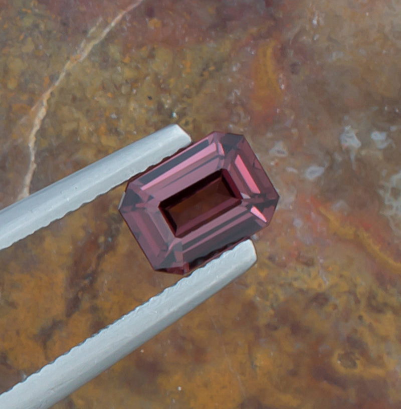 1.22ct Spinel Colored Gemstone Top View Natural Background 
