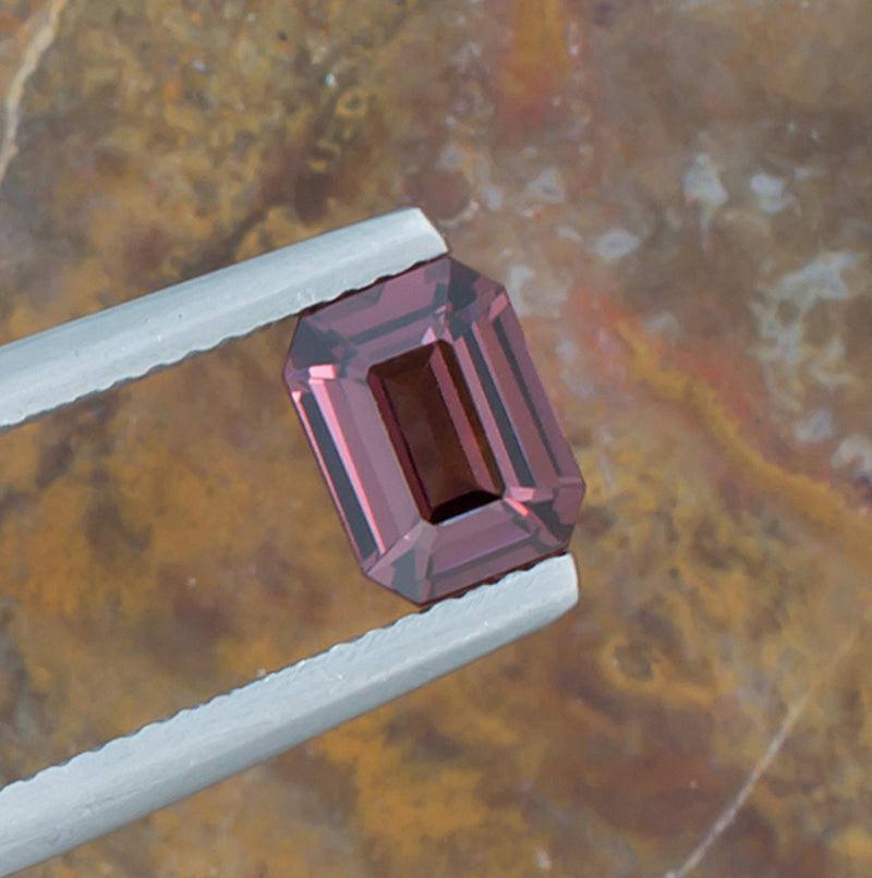 1.22ct Spinel Colored Gemstone Top View Natural Background 
