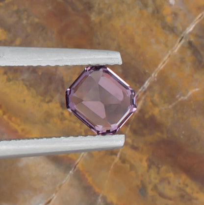 1.24ct Lavender Spinel Colored Gemstone Bottom View Natural Background 
