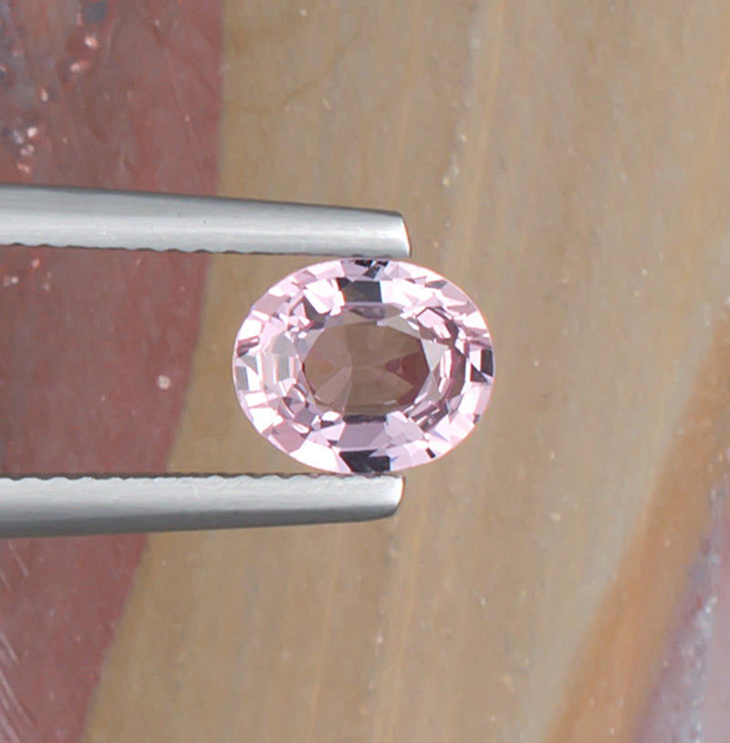 1.42ct Pink Spinel Colored Gemstone Top View II Natural Background
