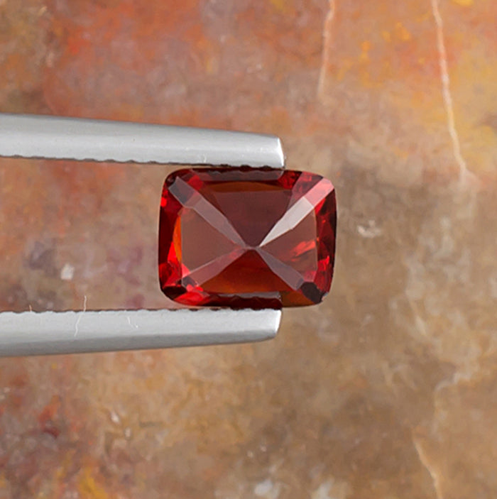 1.50ct Red Spinel Colored Gemstone Bottom View Natural Background 
