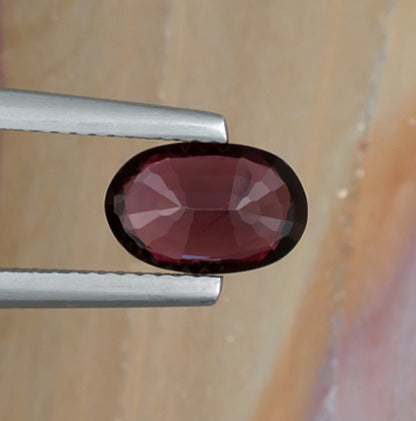 1.70ct Red Spinel Colored Gemstone Bottom View Natural Background 
