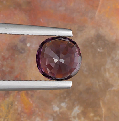 2.28ct Lavender Spinel Colored Gemstone Bottom View Natural Background 
