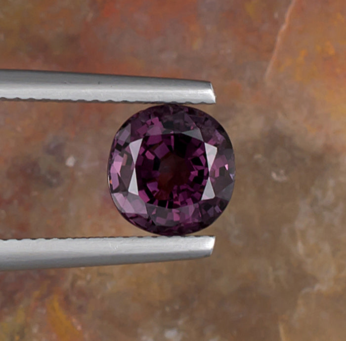 2.28ct Lavender Spinel Colored Gemstone Top View II Natural Background 
