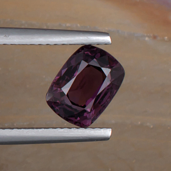 2.68ct Spinel Colored Gemstone Top View Angle Natural Background 
