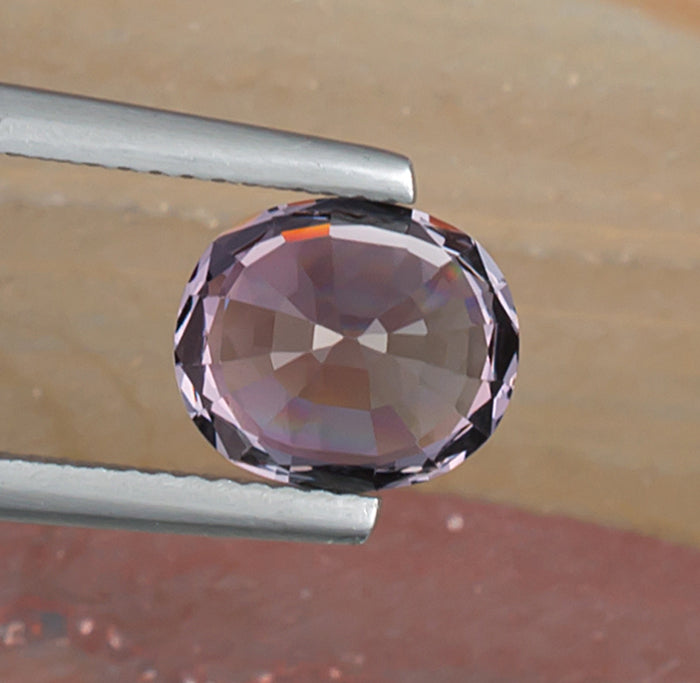 3.04ct Pink Spinel Colored Gemstone Bottom View Natural Background
