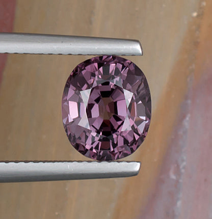 3.04ct Pink Spinel Colored Gemstone Top View Natural Background 
