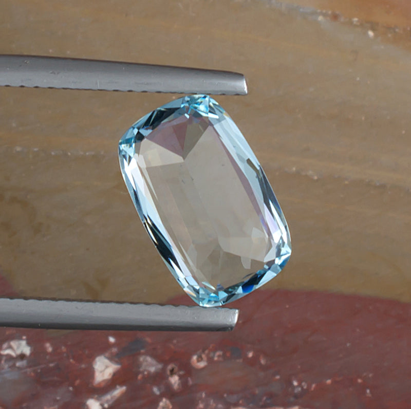 3.07ct Aquamarine Colored Gemstone Bottom View Natural Background 
