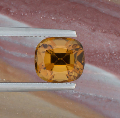 3.86ct Citrine Colored Gemstone Top View Natural Background 
