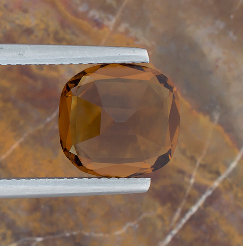 4.28ct Citrine Colored Gemstone Bottom View Natural Background