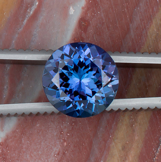 4.42ct Tanzanite Colored Gemstone Top View Natural Background 
