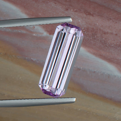 5.58ct Kunzite Colored Gemstone Top View Natural Background 
