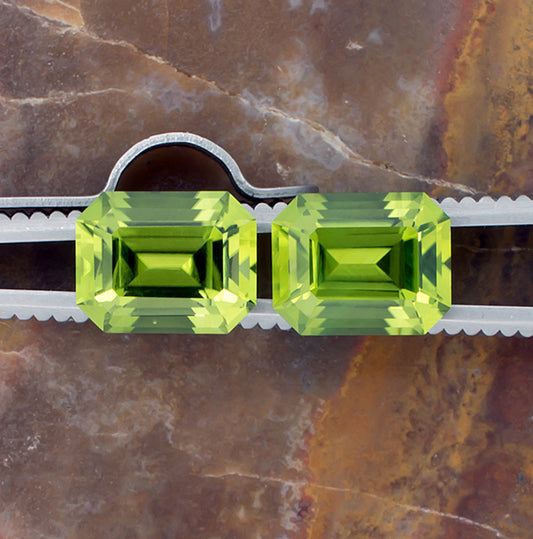 6.55twt Peridot Colored Gemstone Pair Top View Natural Background