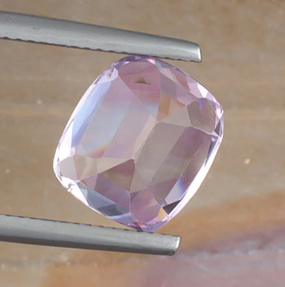 7.95ct Kunzite Colored Gemstone Bottom View Natural Background 
