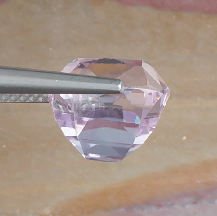 7.95ct Kunzite Colored Gemstone Side View Natural Background 
