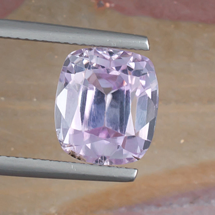 7.95ct Kunzite Colored Gemstone Top View Natural Background 
